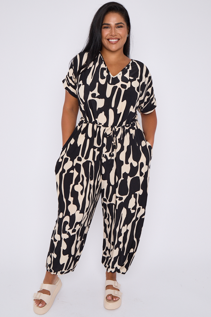 Plus Size Black Printed V Neck Tie Waist Jumpsuit With Pockets