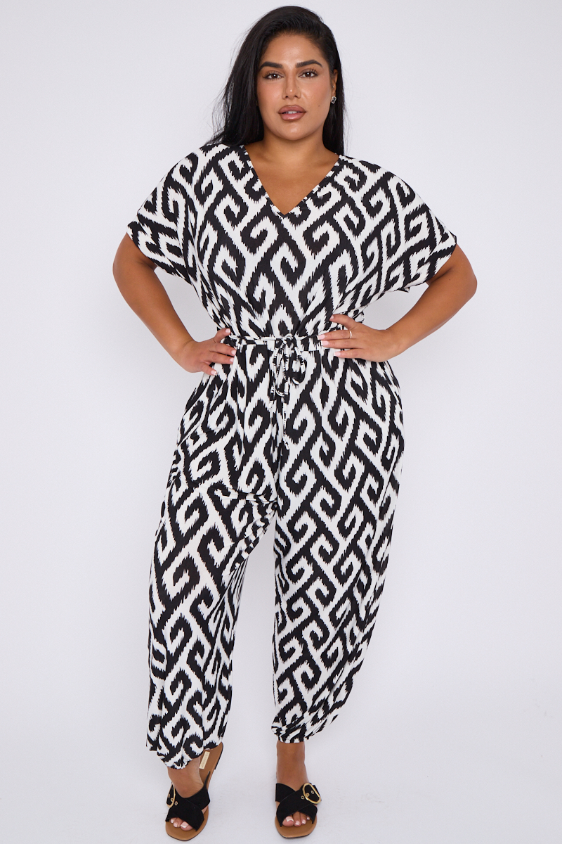 Plus Size Black Printed V Neck Tie Waist Jumpsuit With Pockets